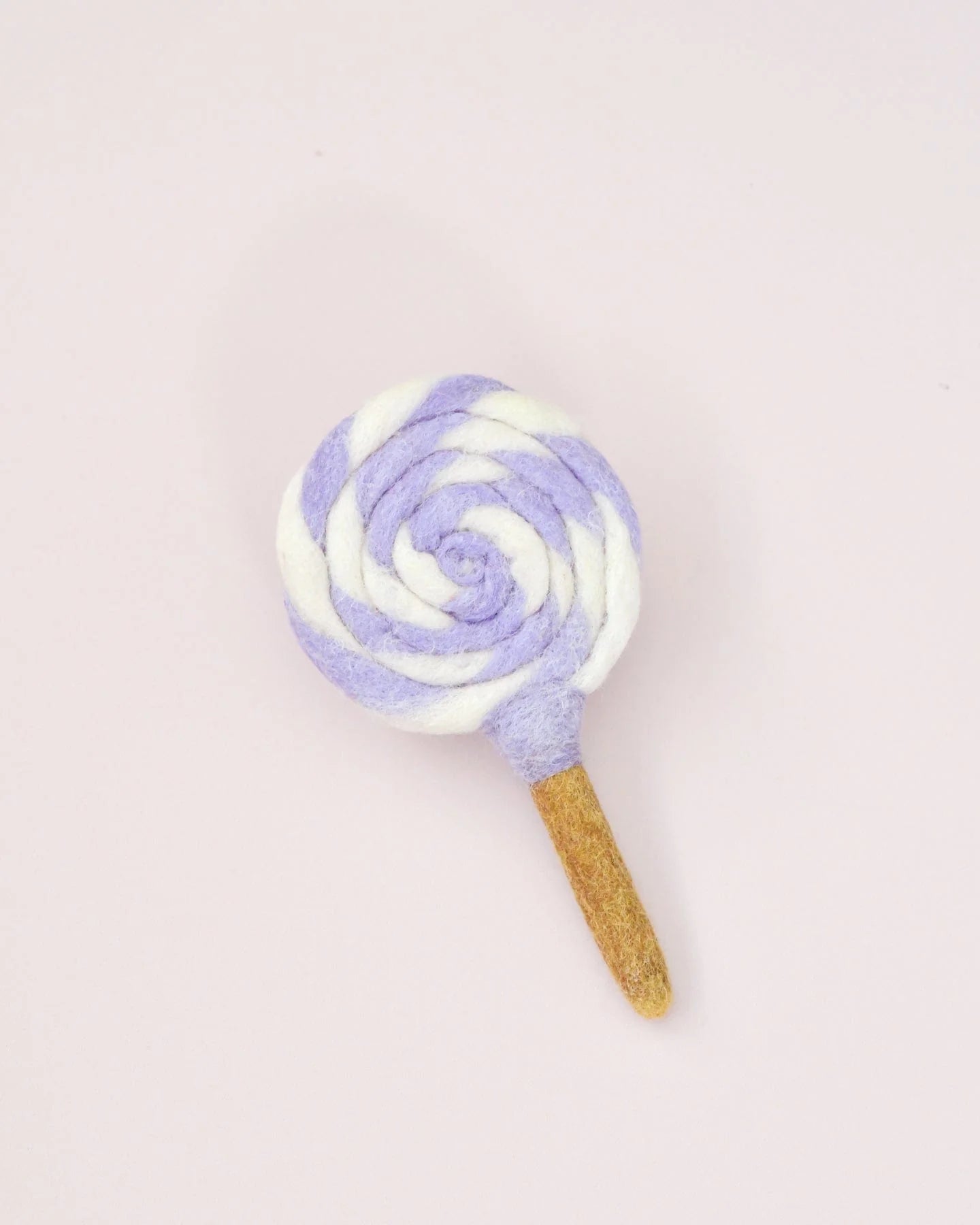 Sucette tourbillonnante violette et blanche en feutre