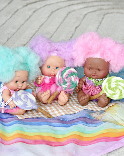 Sucette tourbillonnante en feutre vert citron et blanc