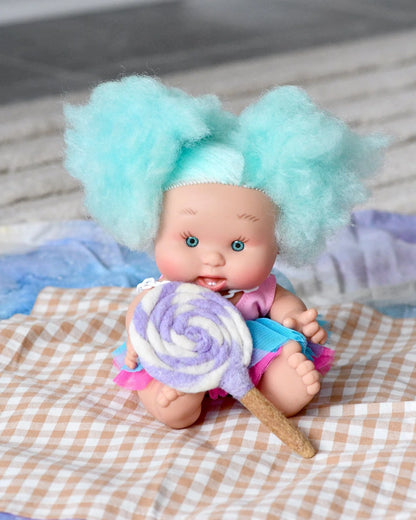 Sucette tourbillonnante violette et blanche en feutre