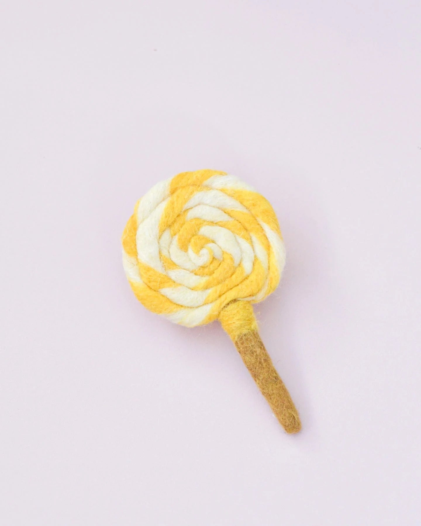 Sucette tourbillonnante jaune et blanche en feutre